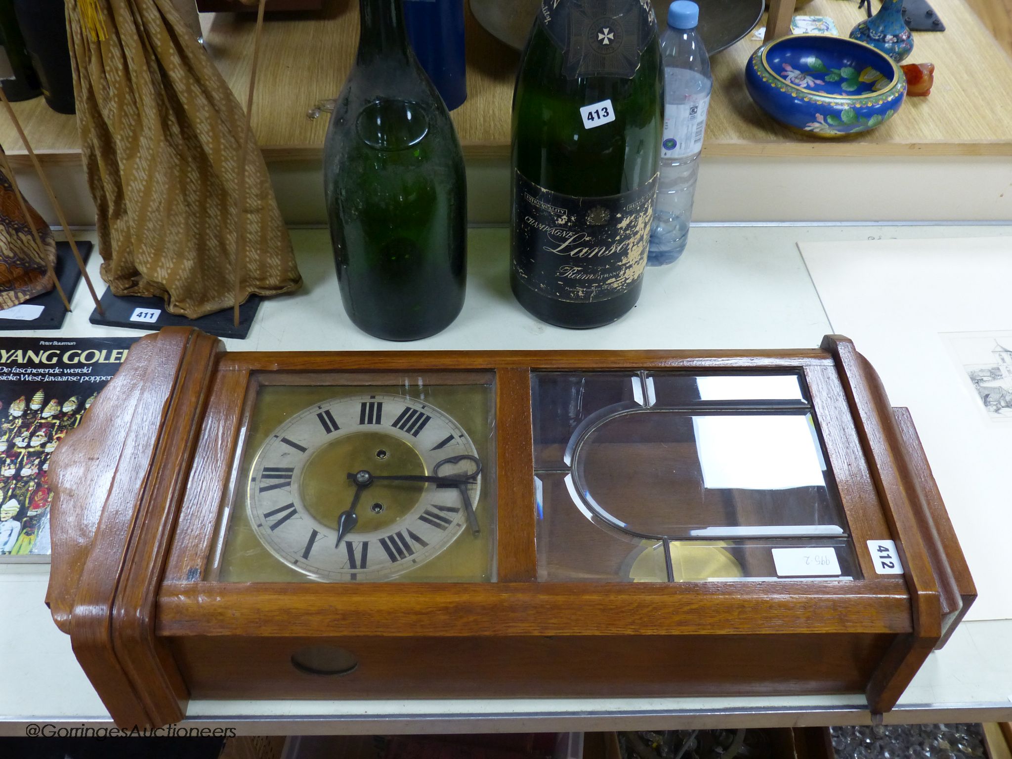 A 1920s German oak wall clock, height 78cm